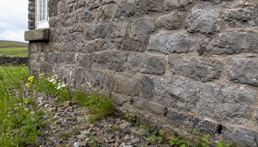 Close-up of UK home brick wall with weep holes