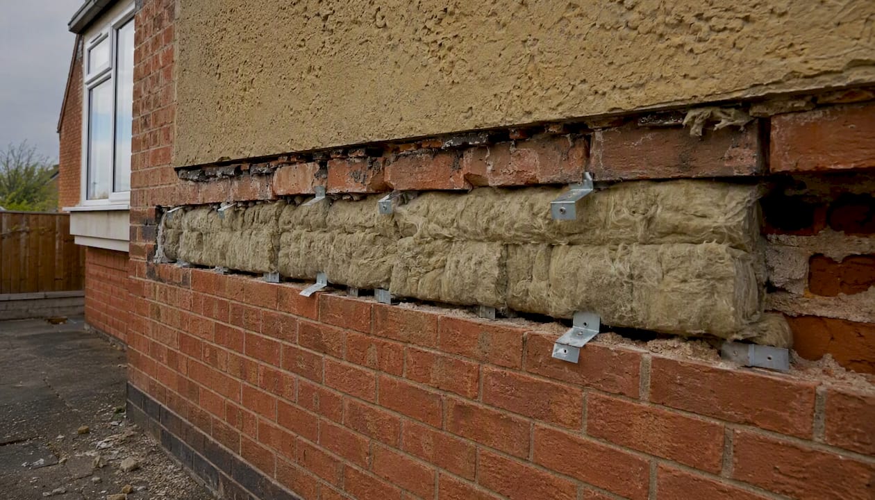Full-fill mineral wool insulation in brick cavity